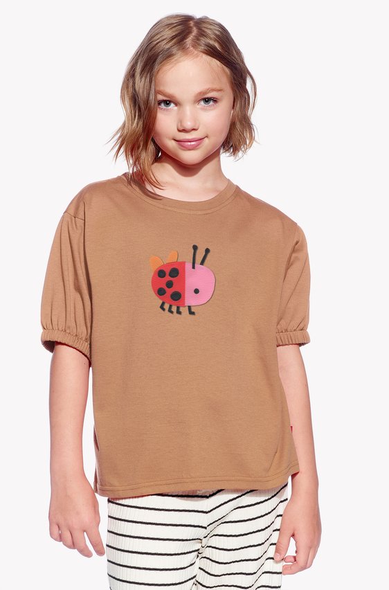 Shirt with a ladybug