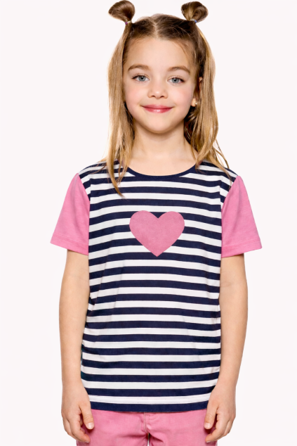 Smiling girl in striped pink attire